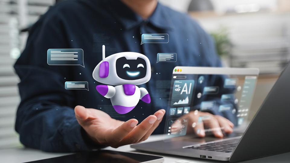 staffice-module-ai A person at a laptop is holding a 3D AI assistant in their hand – symbolising the AI module of the Staffice employee app for automated communication and intelligent support in day-to-day work.